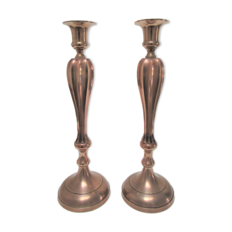 Pair of high solid brass candle holders domed ribbed barrels early twentieth century