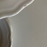 Set of 7 Mougins plates in white enamelled clay with gadroons