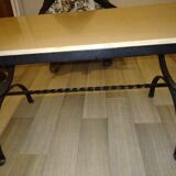 Wrought iron coffee table and beige marble top