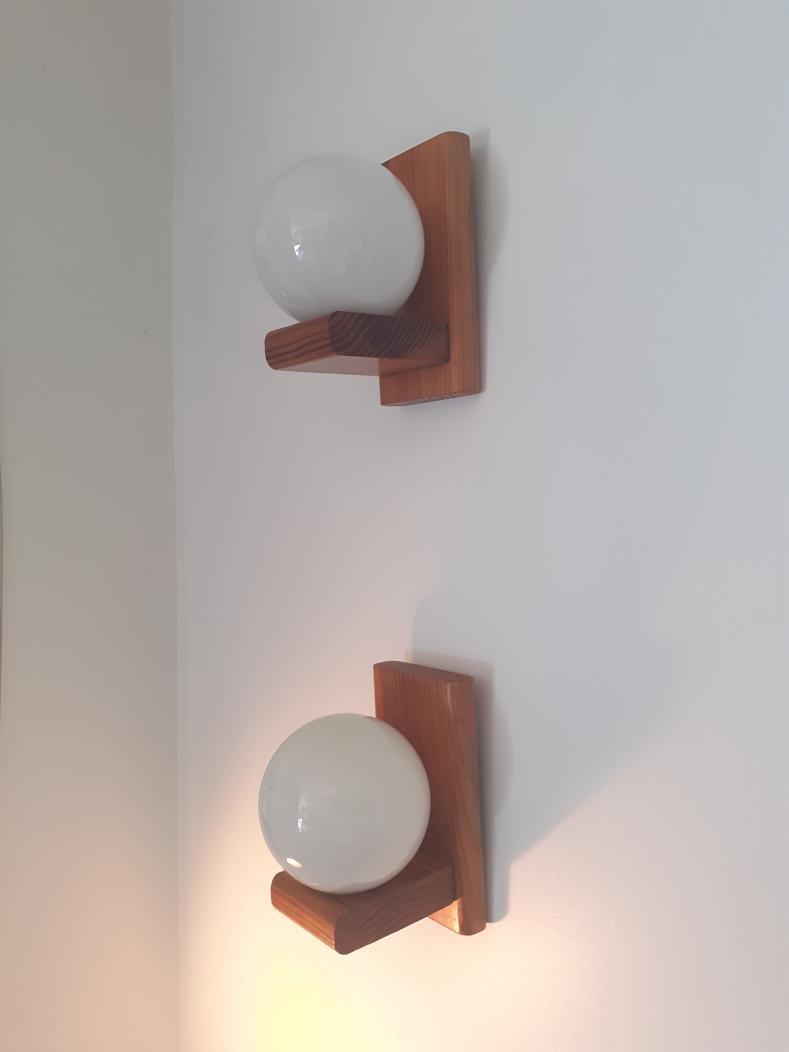 Pair of sconces in solid pine and white opaline