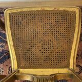 Pair of Louis XVI style fluted gilded chairs
