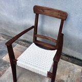 Scandinavian chair in wood and woven natural fibre.