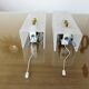Pair of pull switch wall lights in perspex and gilded brass, France, circa 1960.