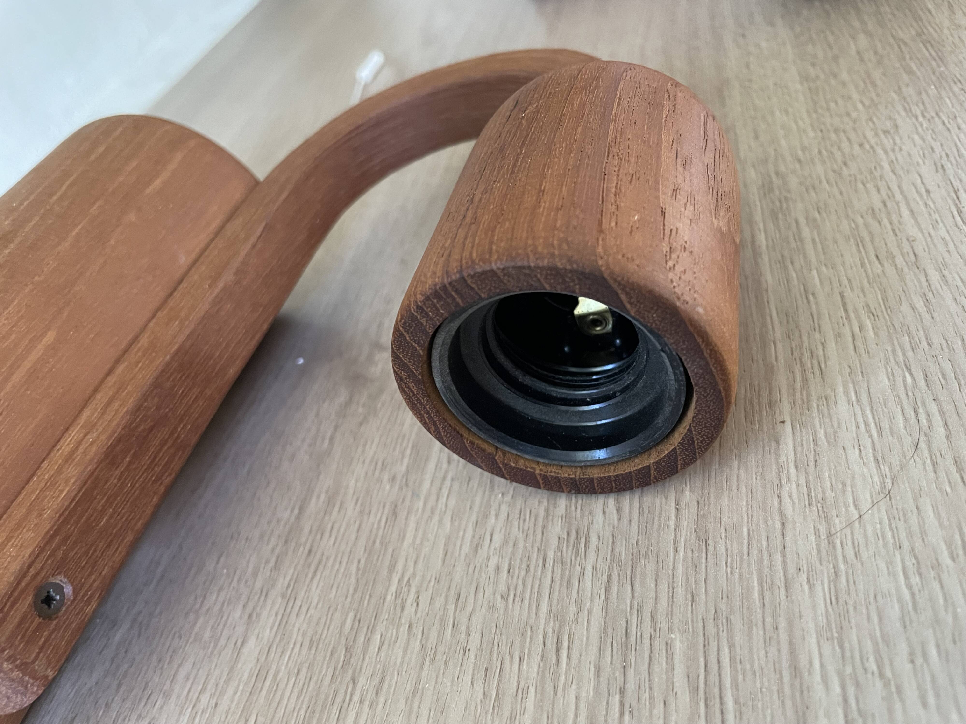 Pair of Scandinavian teak wall lights, Dolmus, 70s