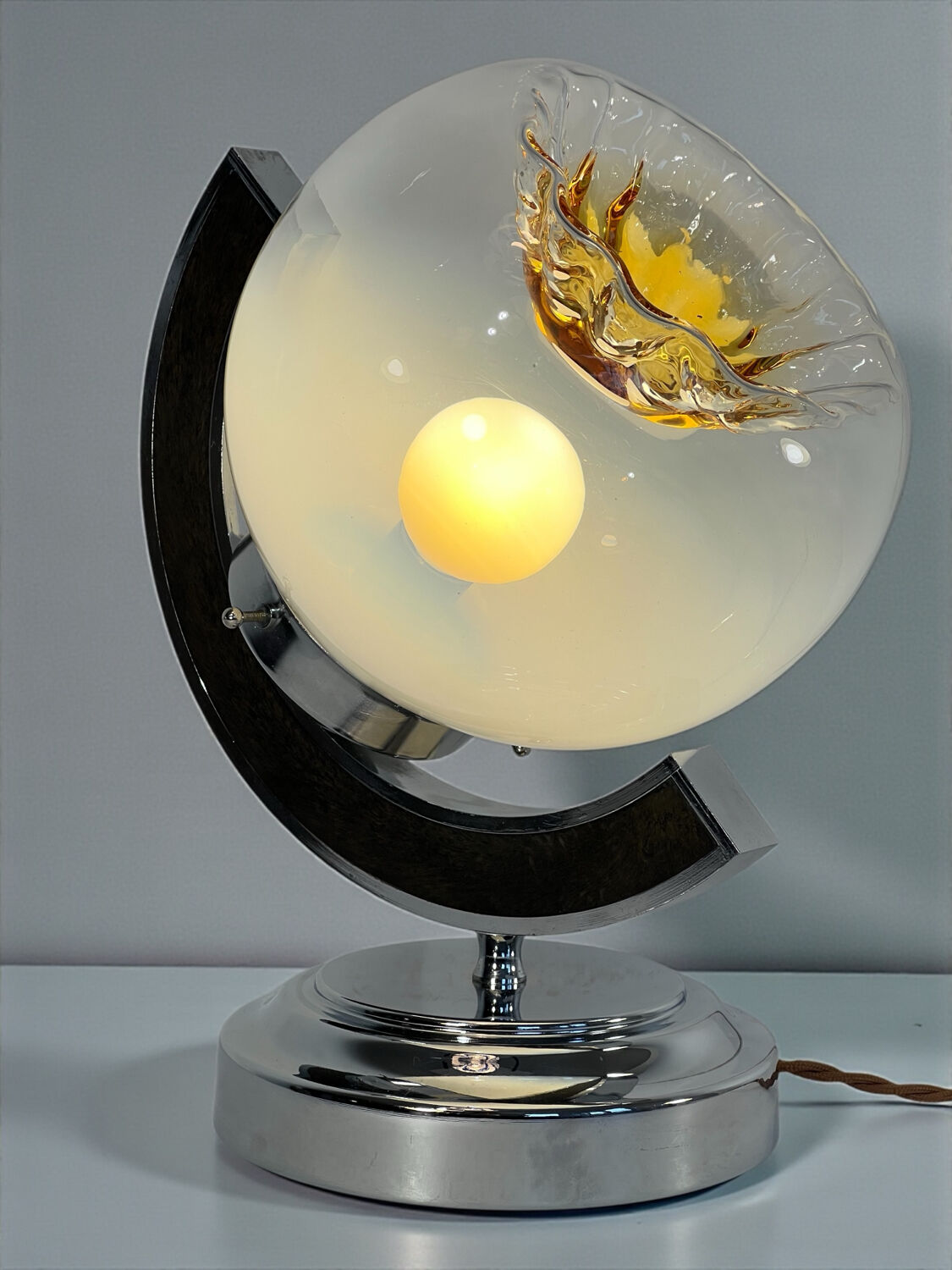 Pair of table lamps with large Murano globes from the 1970s.