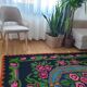 Floral handwoven green and fuchsia rug, made in wool, bohemian design 170x232cm