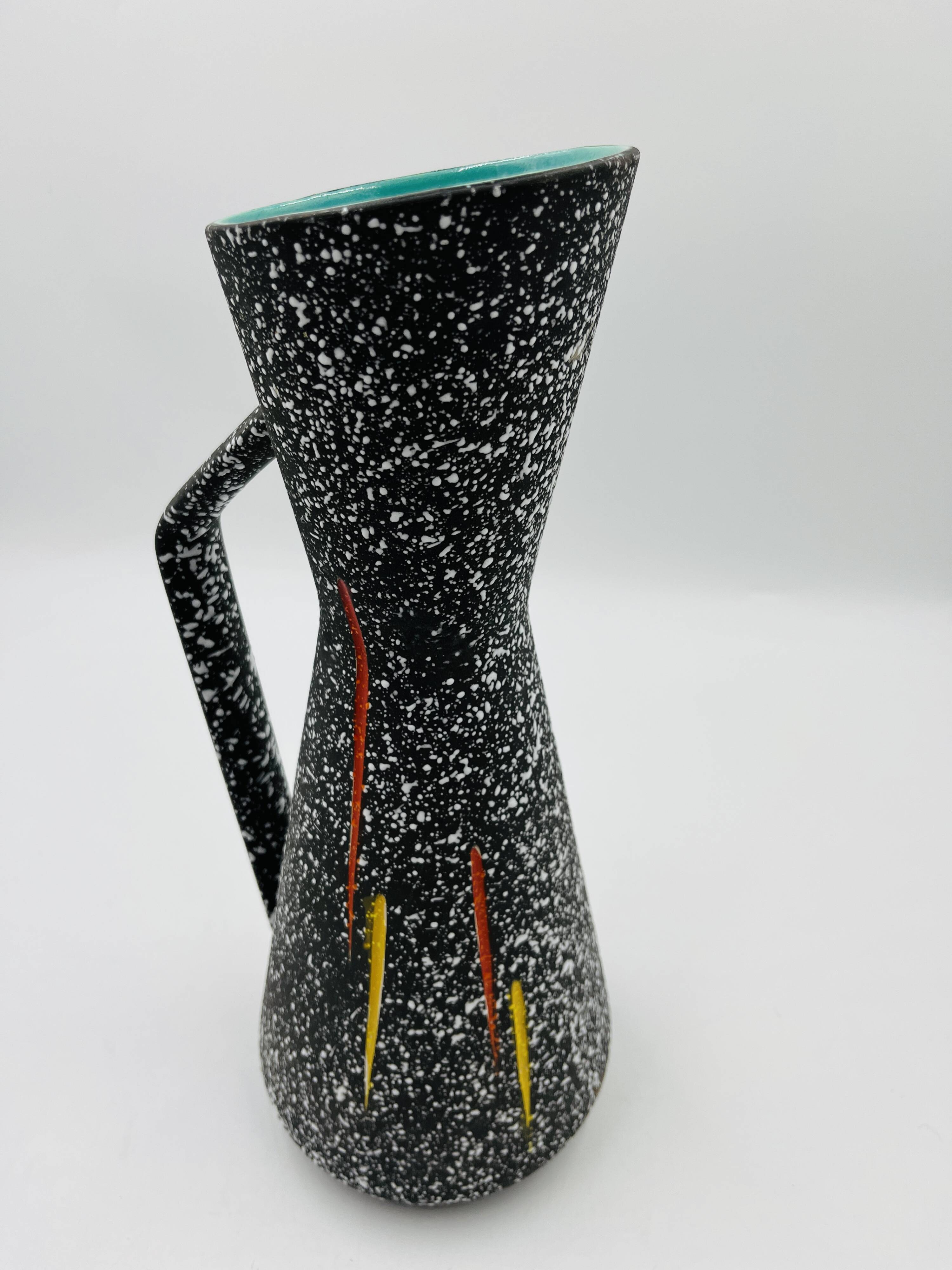Vintage pitcher Hubert Bequet in speckled ceramic Belgium
