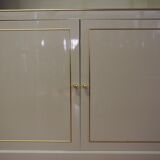 Showcases in lacquered wood, glass and brass  1970s, set of 4