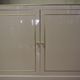 Showcases in lacquered wood, glass and brass  1970s, set of 4