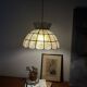 Capiz shell pendant light with flowers