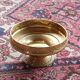 Fruit bowl, basket on foot, compote dish in embossed brass.
