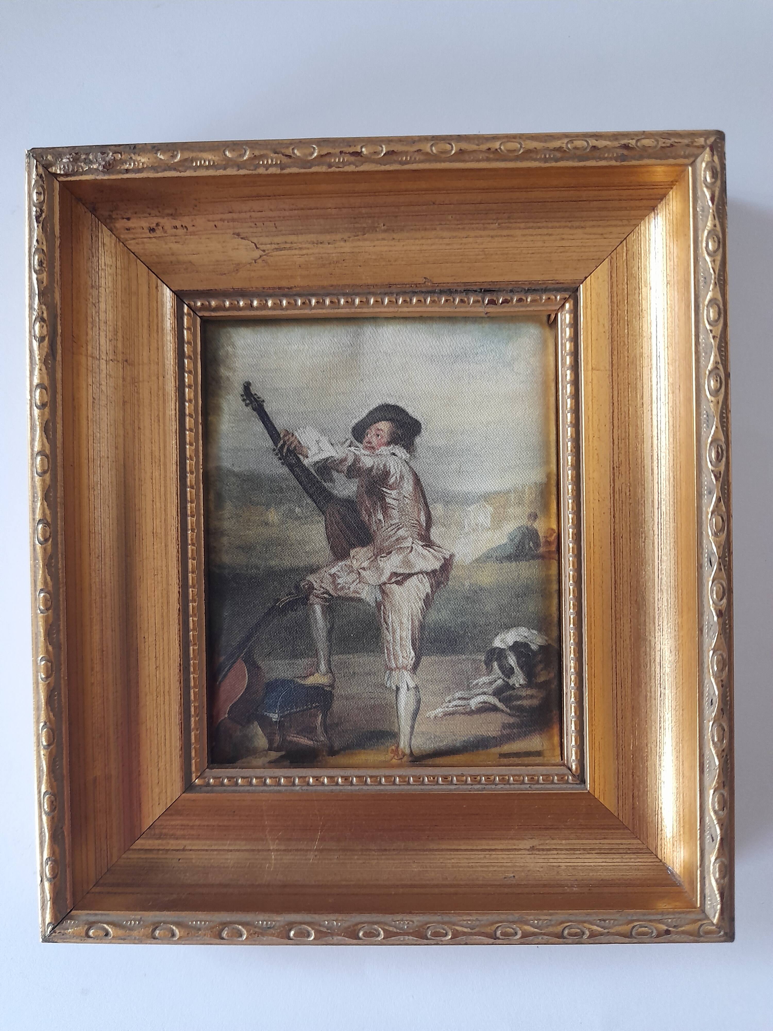 Old golden frame "lute player" on silk