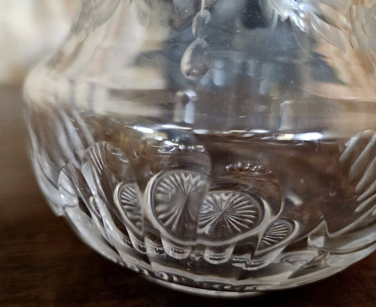 Pair of antique Louis XVI style bottles in finely engraved crystal and silver.