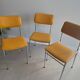 LM vintage chrome and orange/mustard yellow faux leather chairs