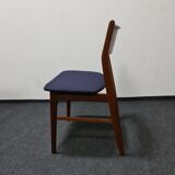 A pair of vintage teak dinning chairs