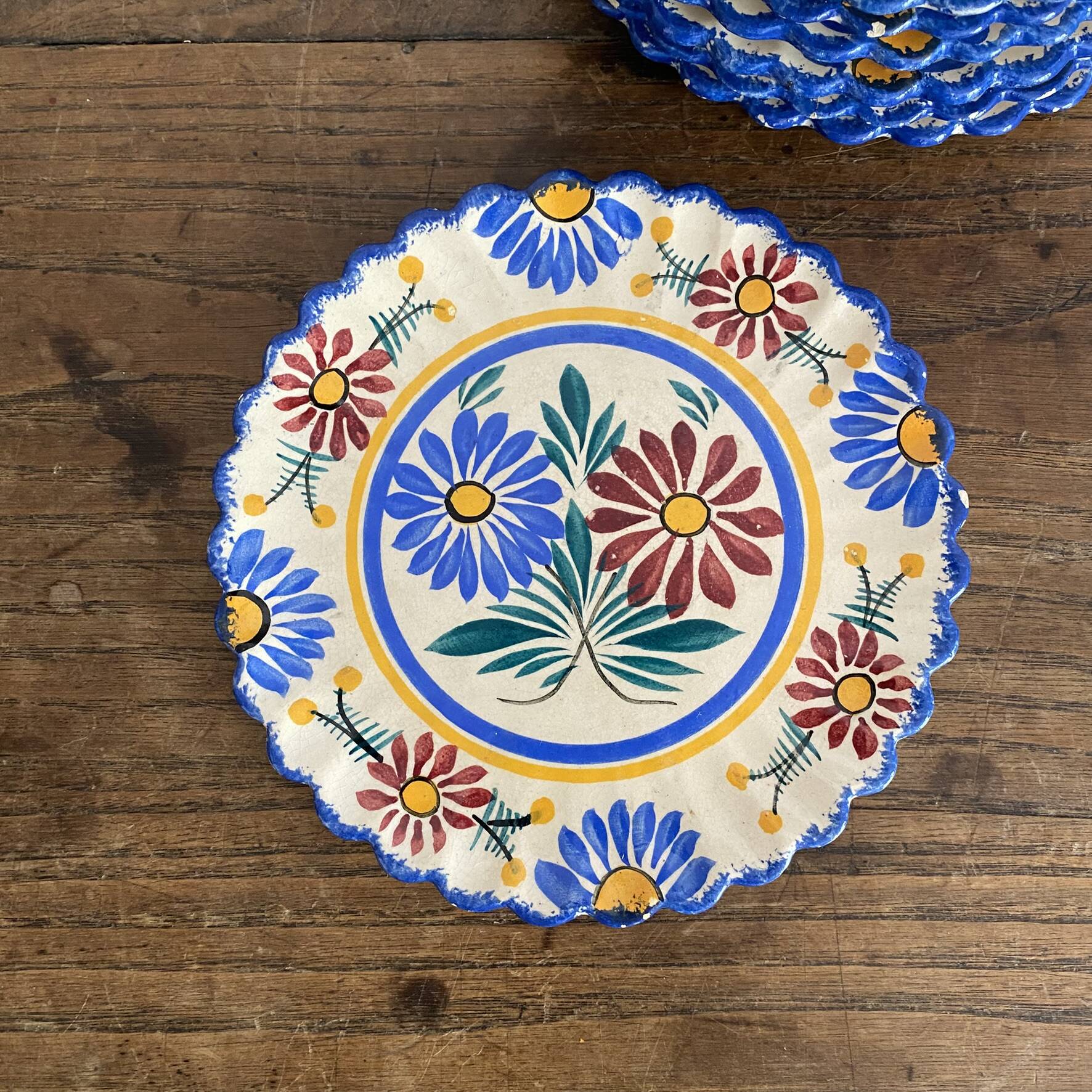 Henriot Quimper dessert plates, hand-painted earthenware.