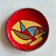 Red plate with abstract decoration, Atelier Cerenne Vallauris – 1950s