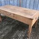 Antique solid cherry farmhouse table with 3 drawers and 1 pull out.