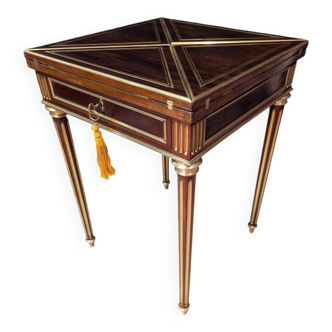 Louis XVI mahogany game table with handkerchiefs.