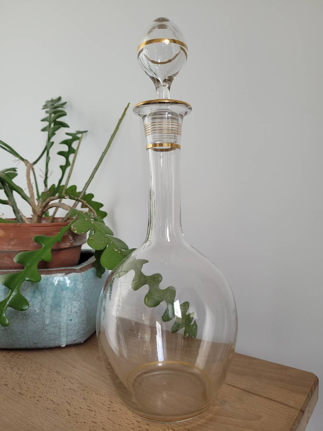 Glass carafe with gold trim