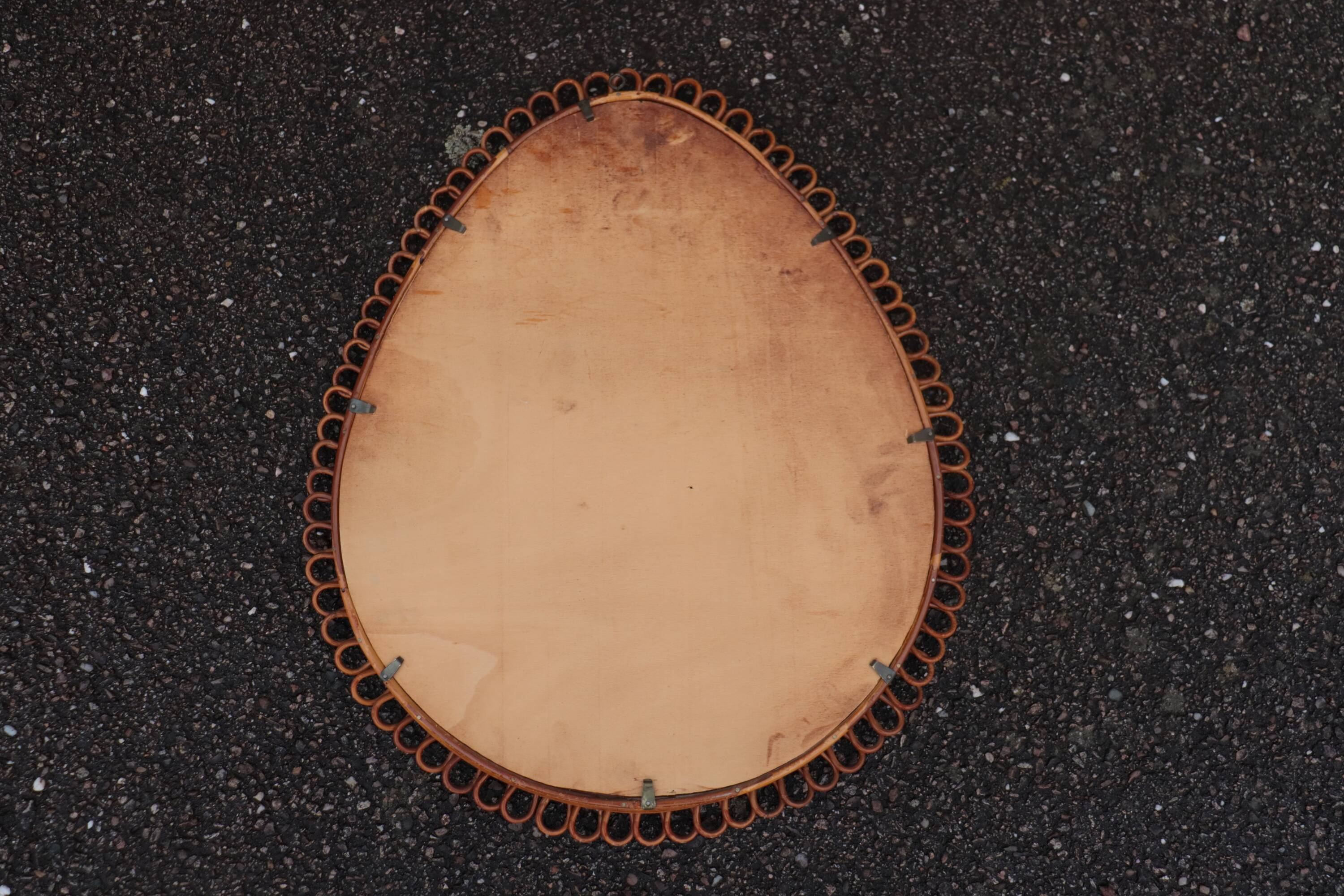 Large rattan mirror attributed to Franco Albini, Italy 1960.