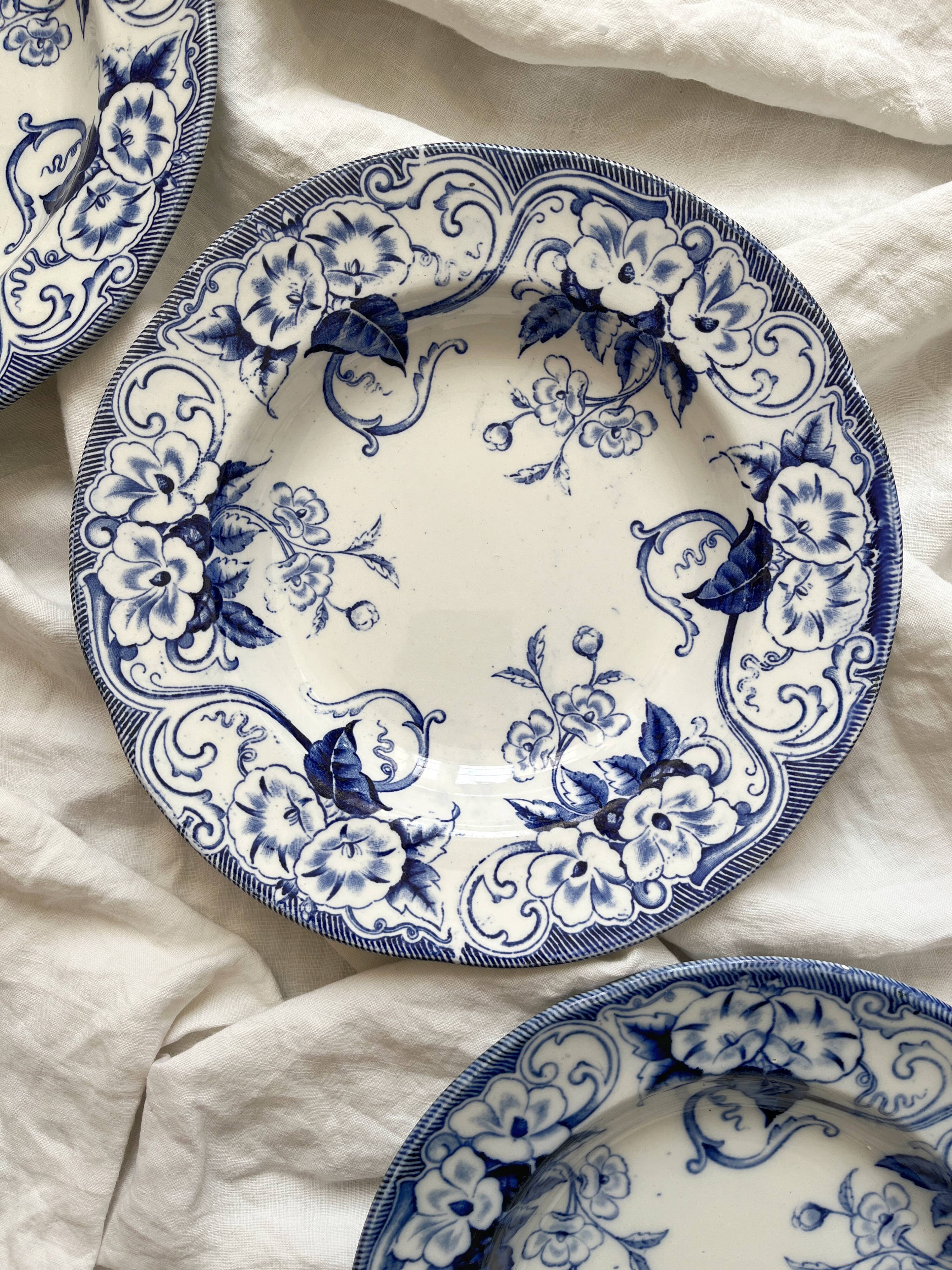 Three Flora ironstone soup plates, Creil and Montereau, late 19th century