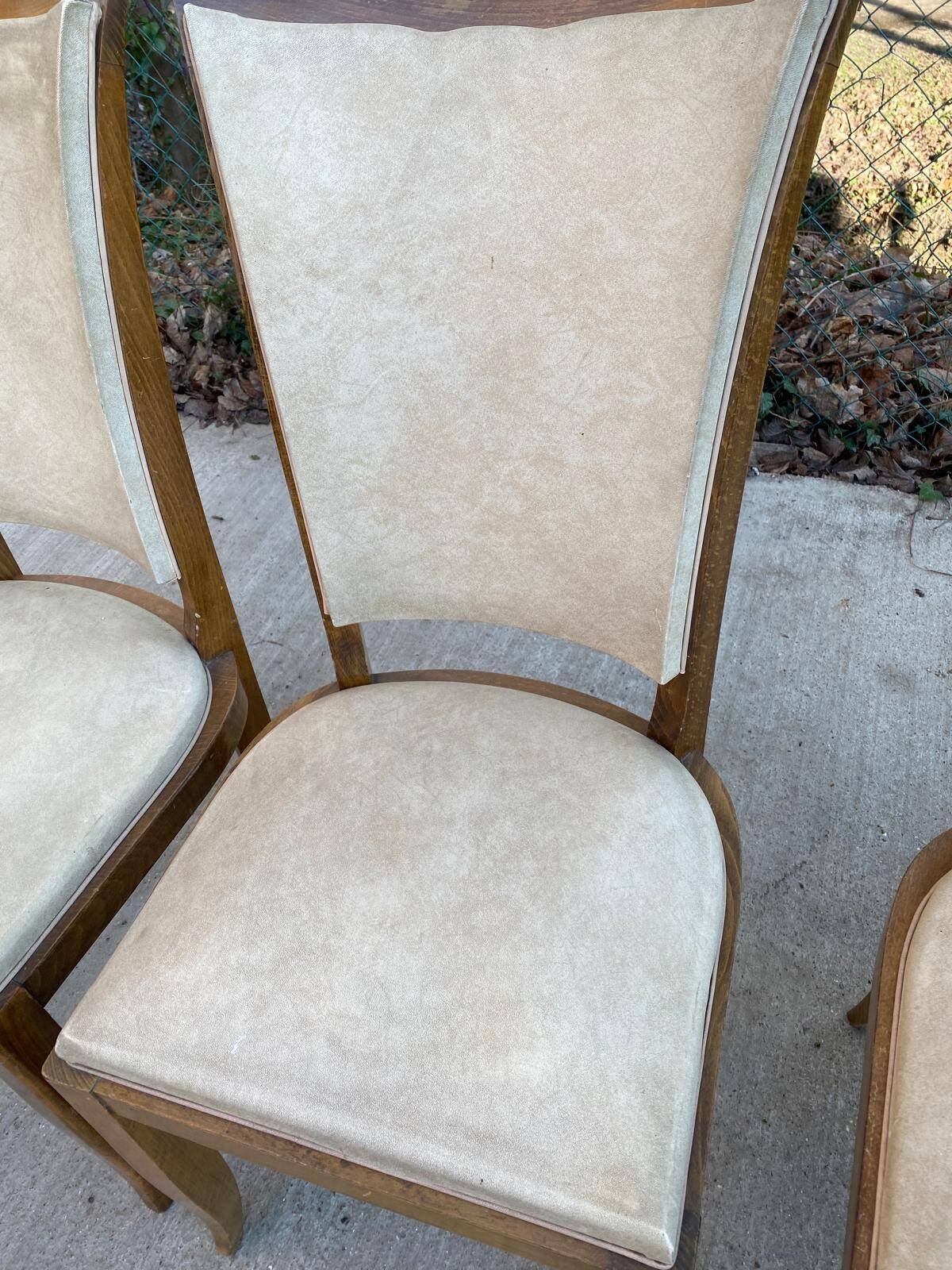 6 Italian Scandinavian style dining chairs from the 1950s in wood and leather.