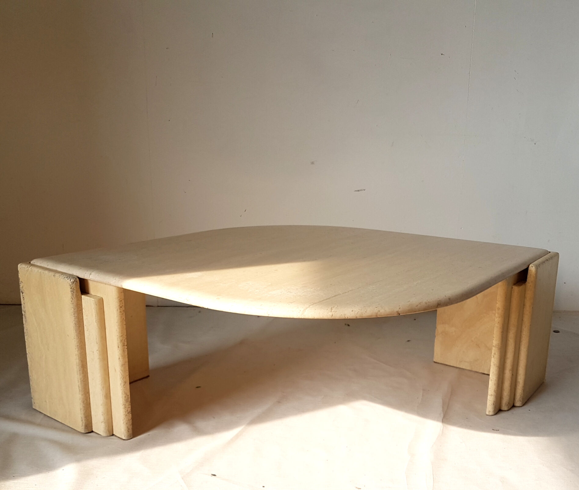 Travertin teardrop shaped coffee table, italy 1970