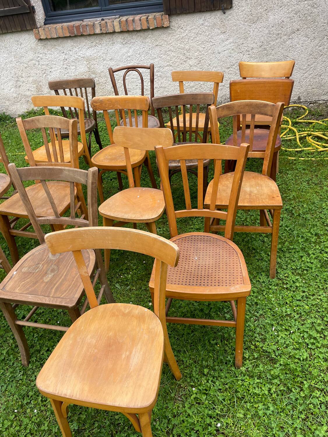 Lot of 16 mismatched bistro chairs