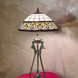 Antique patinated bronze regulator lamp with Tiffany glass shade in very good condition