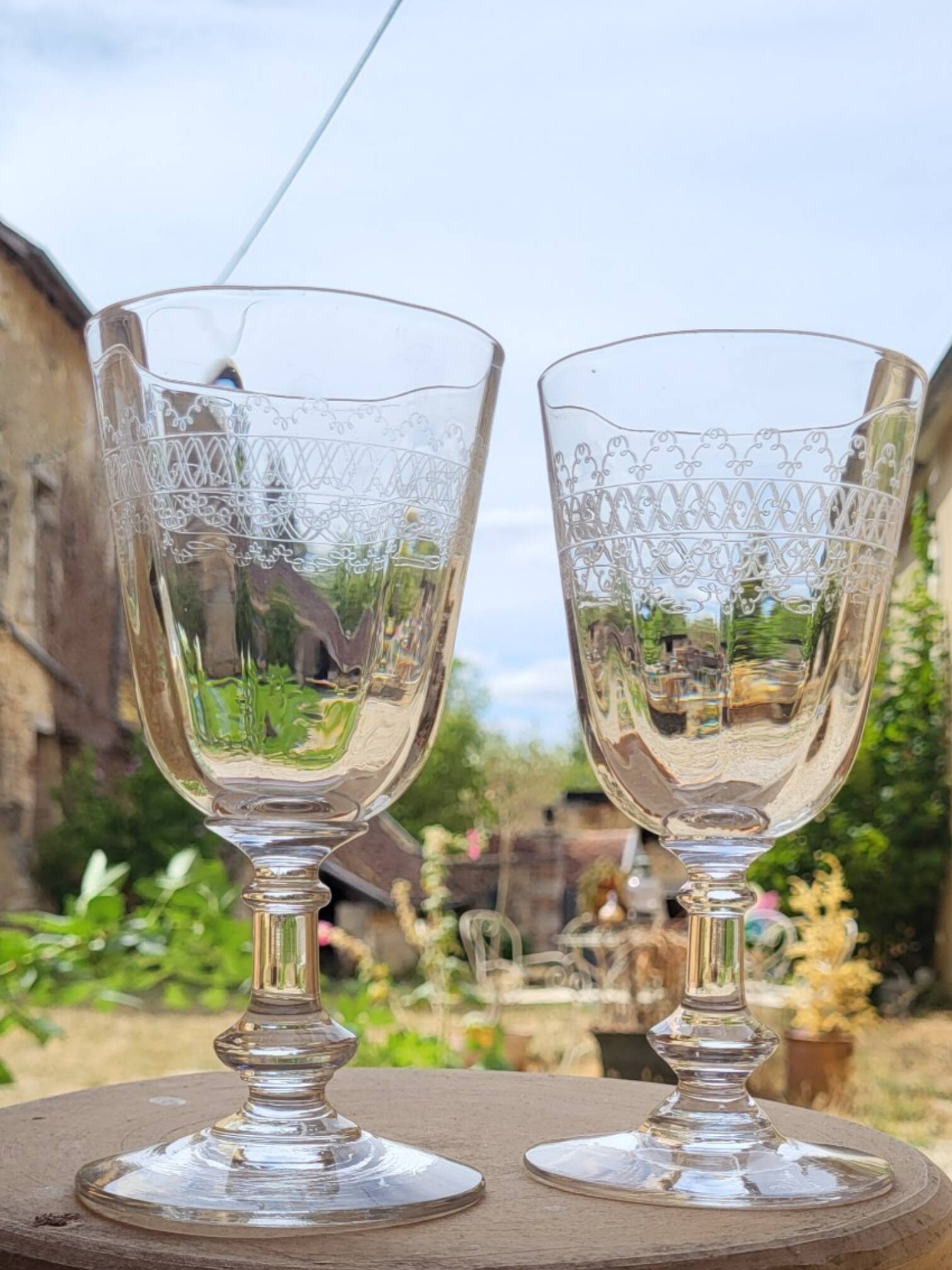 6 engraved glass wine/water glasses from the early 20th century.