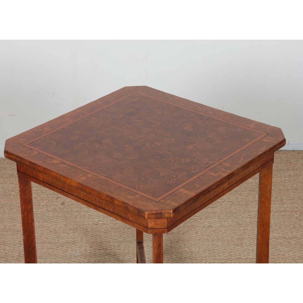 Square game table in marquetry, early 20th century