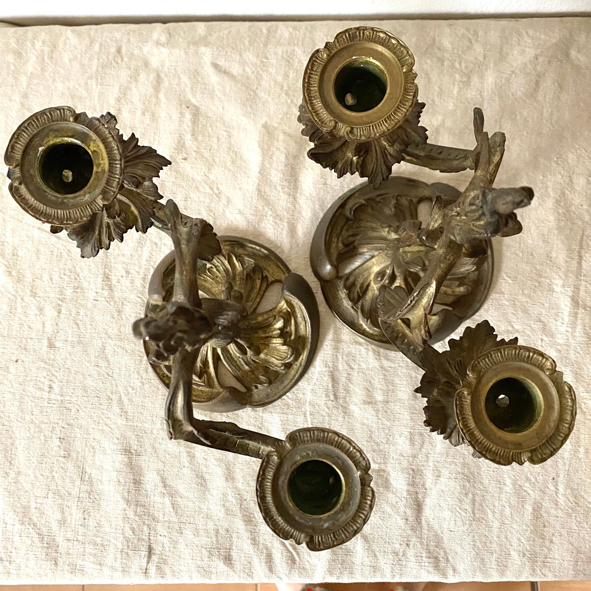 Pair of antique bronze candlesticks at the end of the table XIXth