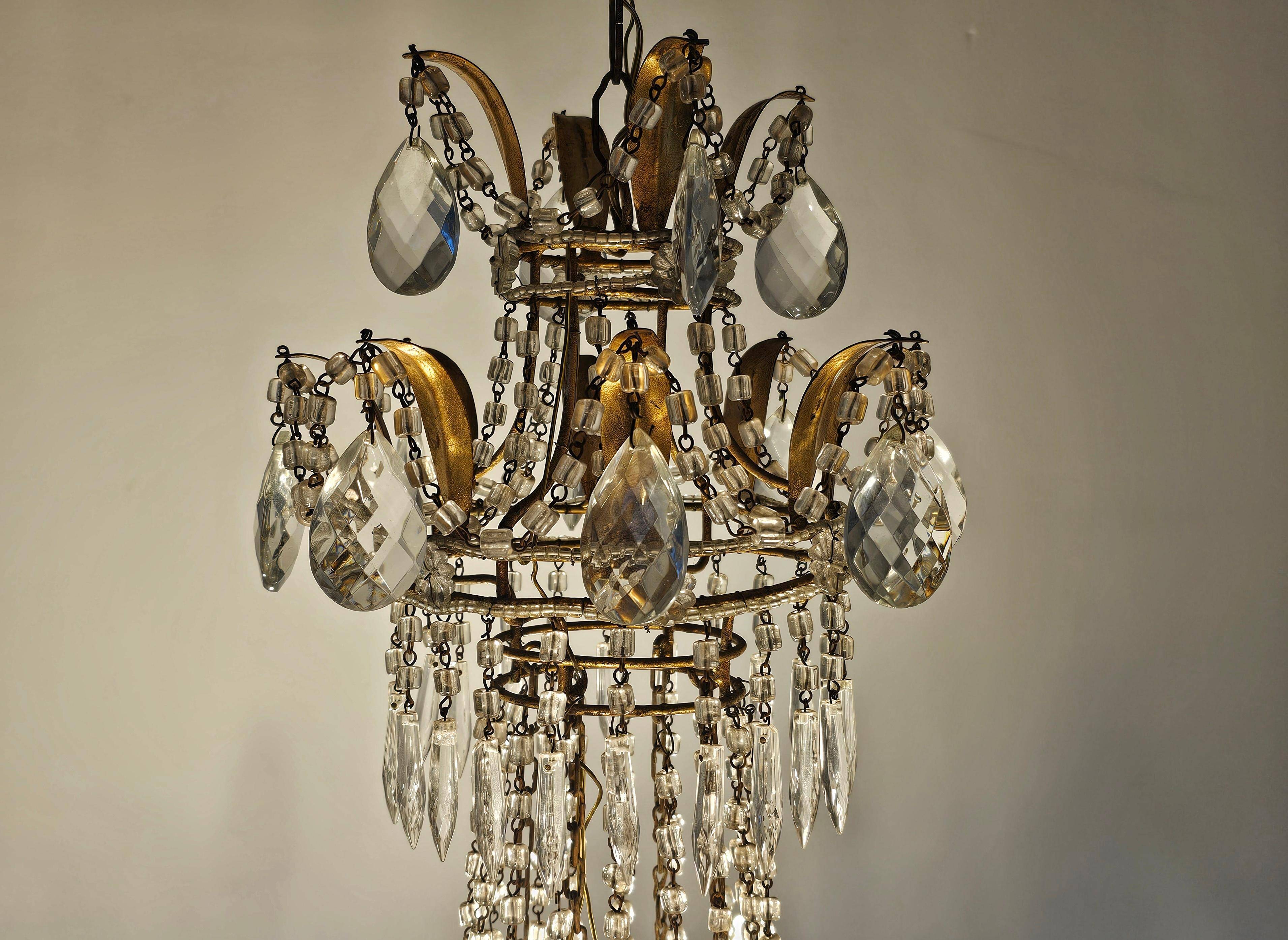Antique crystal chandelier with floral details 1910