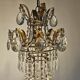 Antique crystal chandelier with floral details 1910