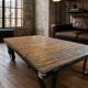 Industrial coffee table: mining cart, weathered wood top, quarries.