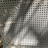 Perforated metal armchairs