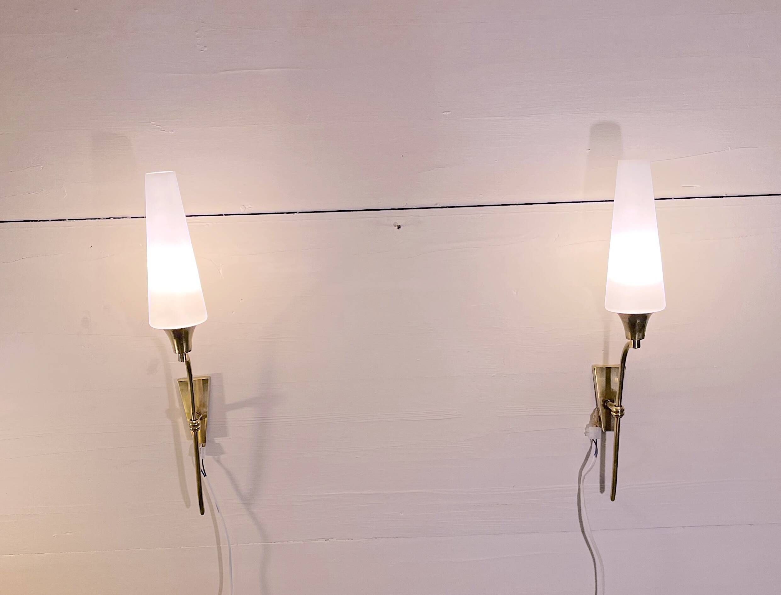 Pair of tall brass and white opaline sconces, mid-century France