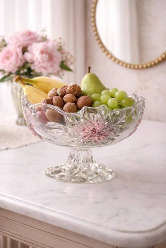 Footed glass fruit bowl