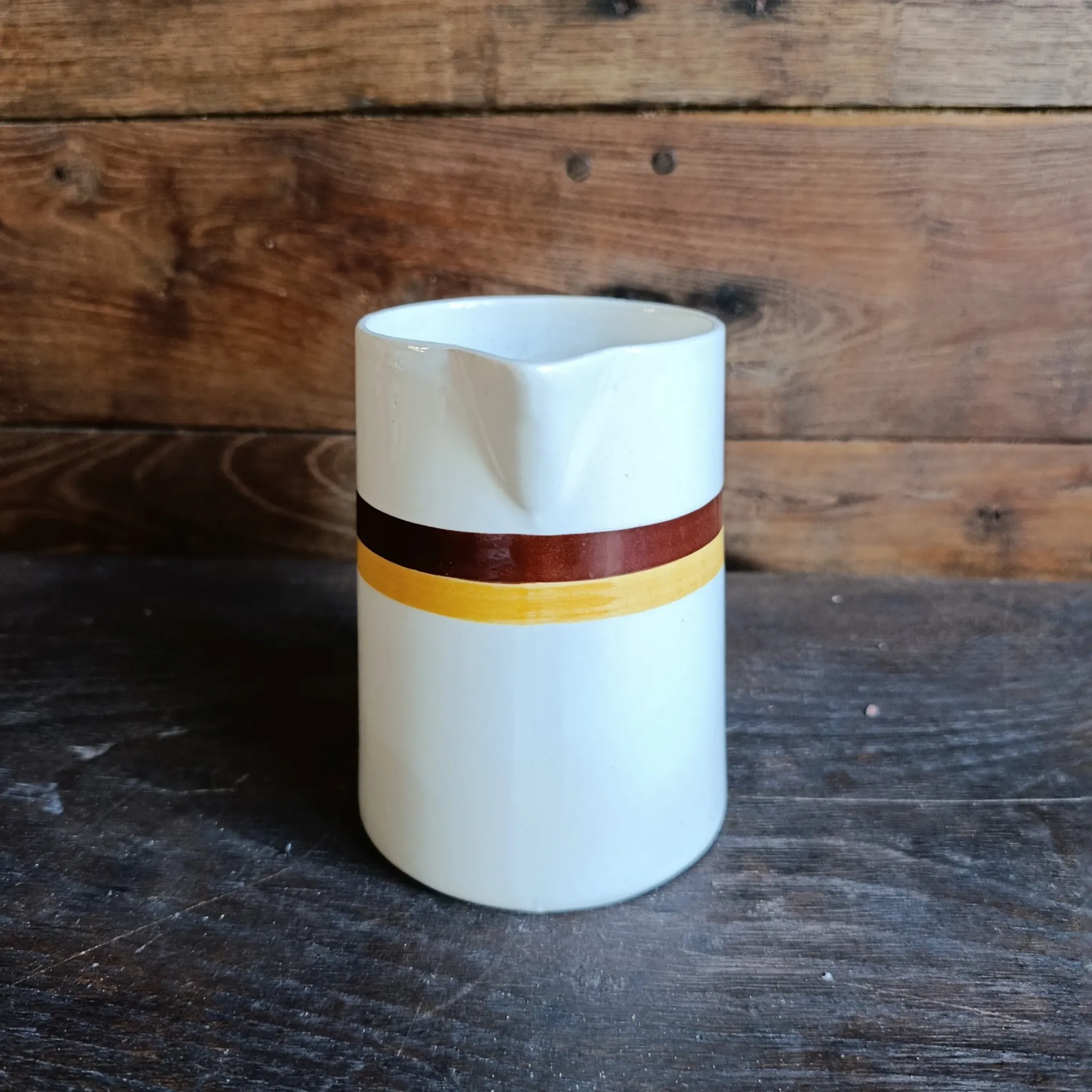 Vintage French ceramic pitcher with brown and ochre stripes