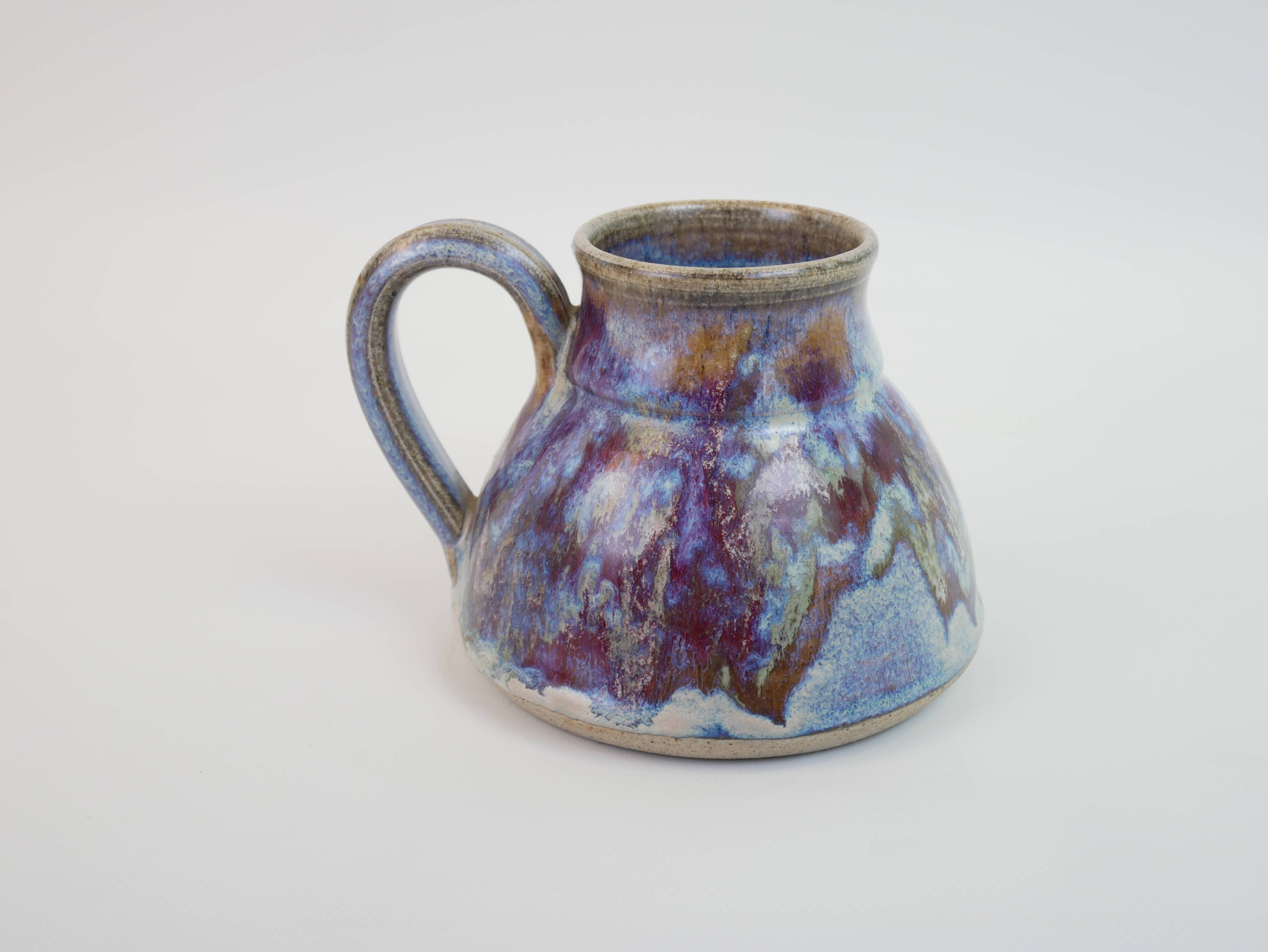 signed blue purple enamel ceramic pitcher