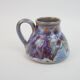 signed blue purple enamel ceramic pitcher