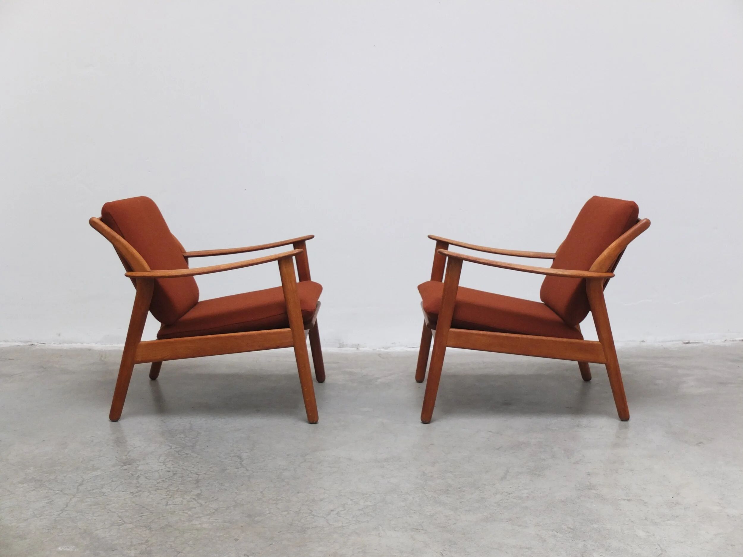 Danish pair of easy chairs in oak by Niels Koefoed, 1960s