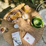 Vintage round table in woven rattan and black wrought iron – 1950s / 1960s