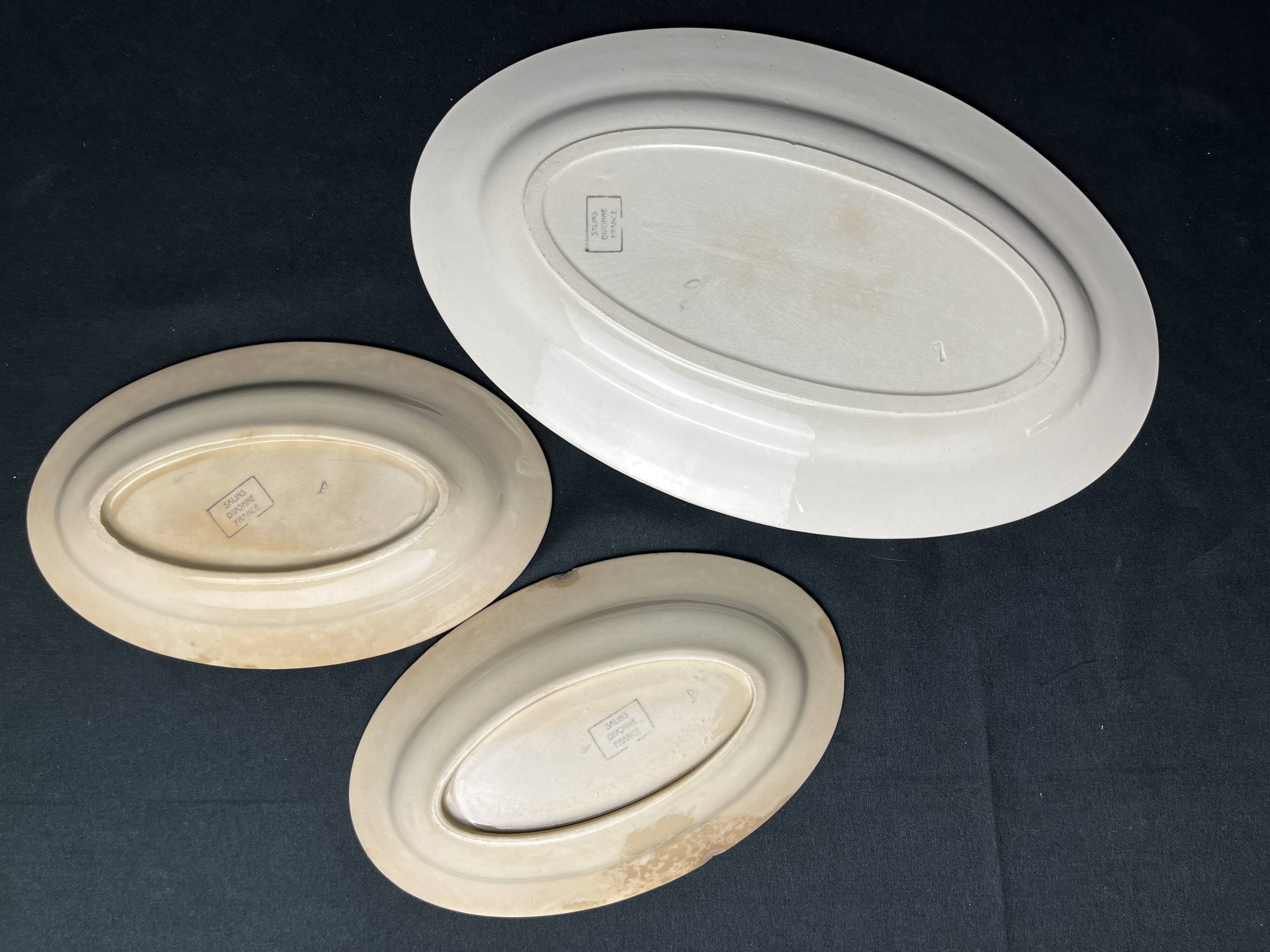 Art Deco, a dish and two Salins earthenware dishes circa 1940