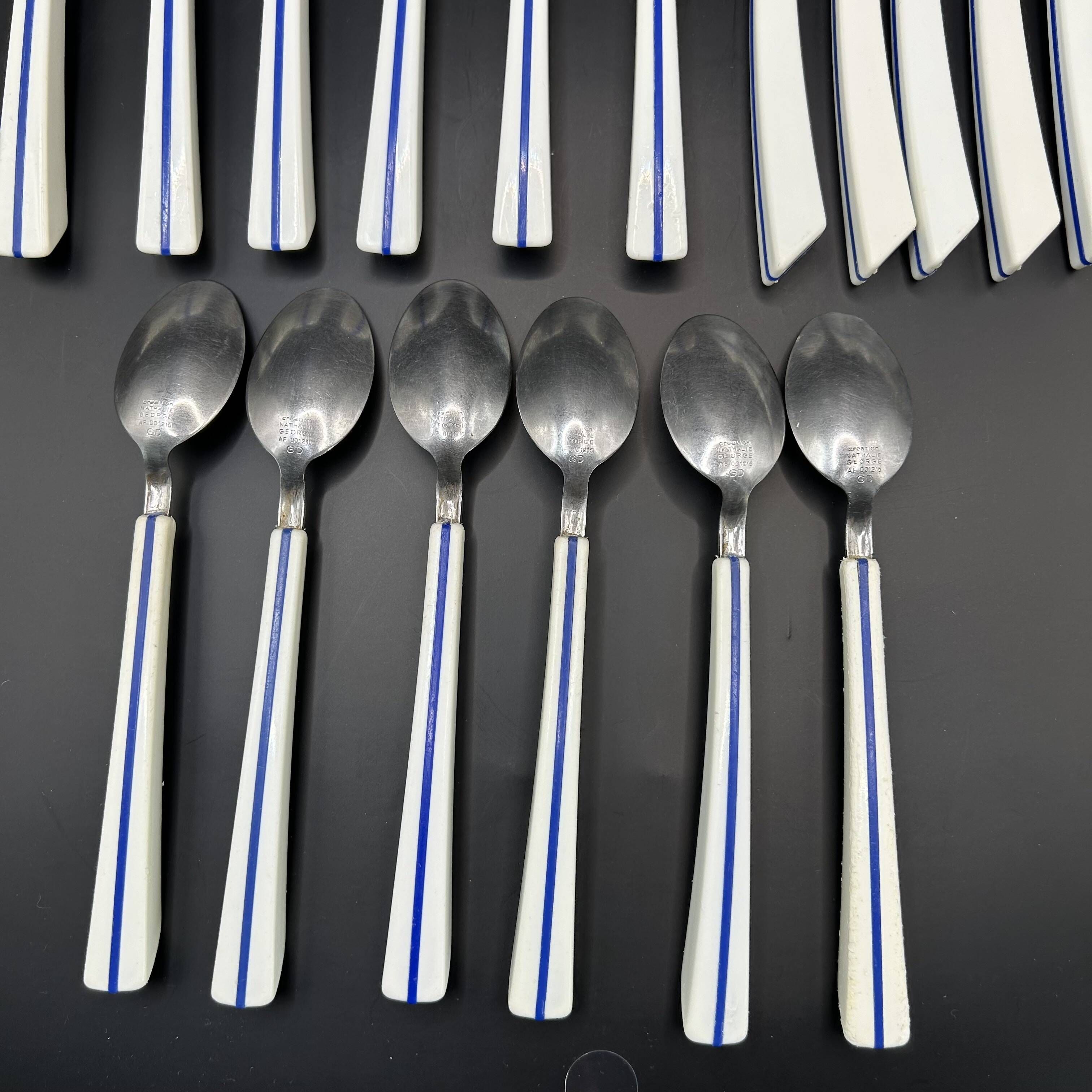 18 Air France place settings by Nathalie George for Guy Degrenne