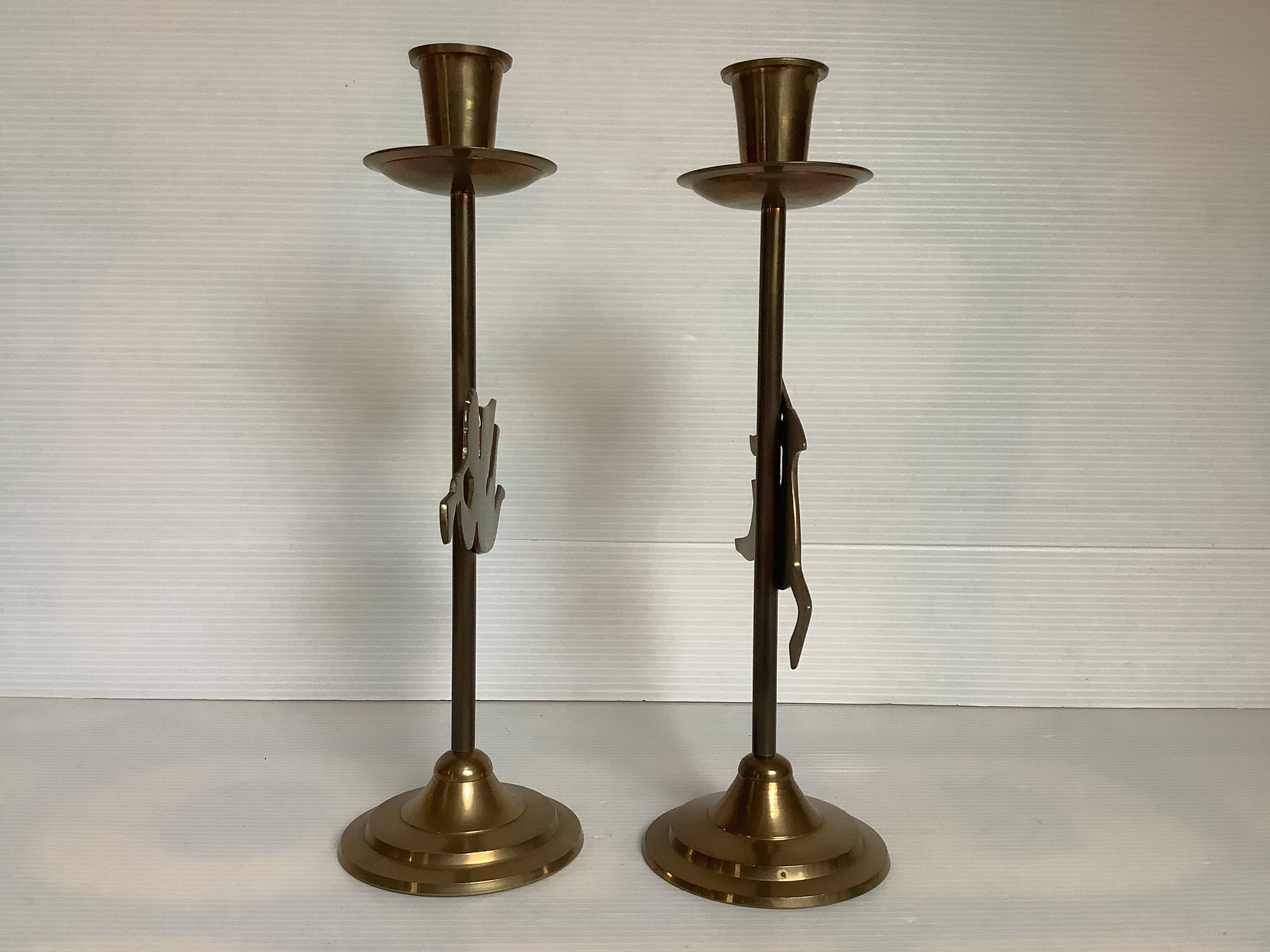 Pair of brass Christmas angel and reindeer candle holders