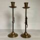 Pair of brass Christmas angel and reindeer candle holders