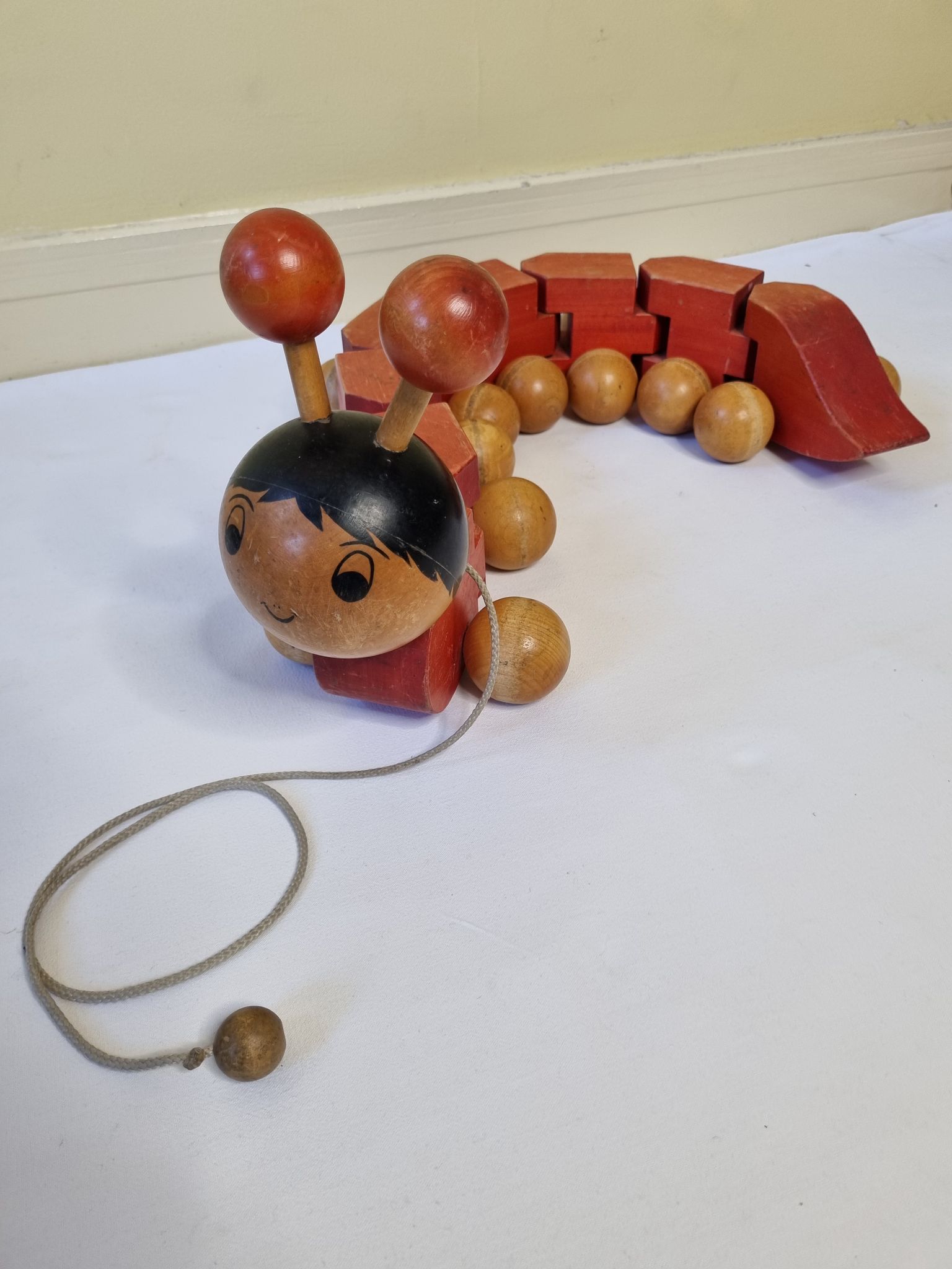 Vintage pulling toy, "centipede", 82 cm, made in Switzerland