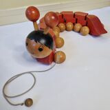 Vintage pulling toy, "centipede", 82 cm, made in Switzerland